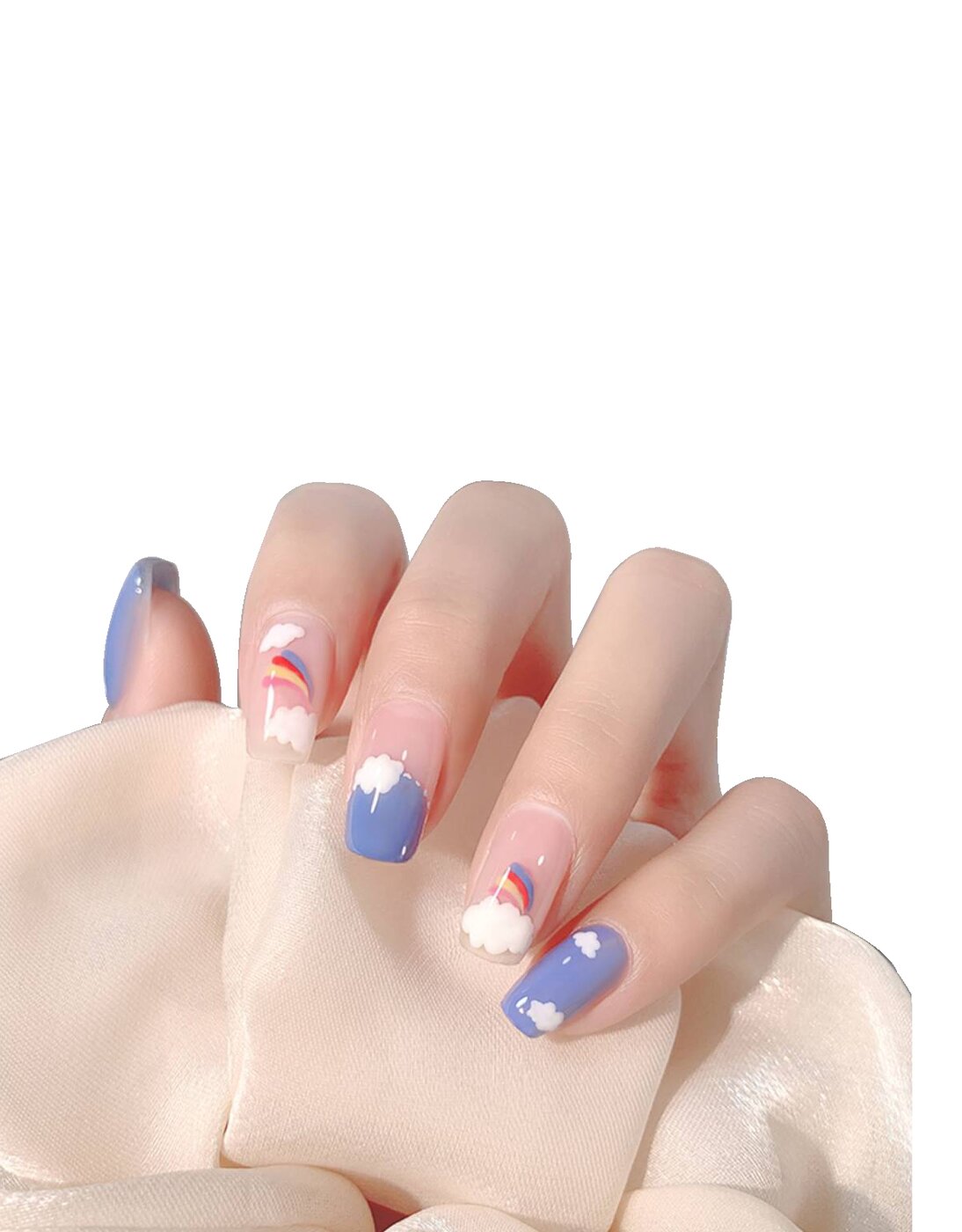 Nail art arcobaleno con nuvole